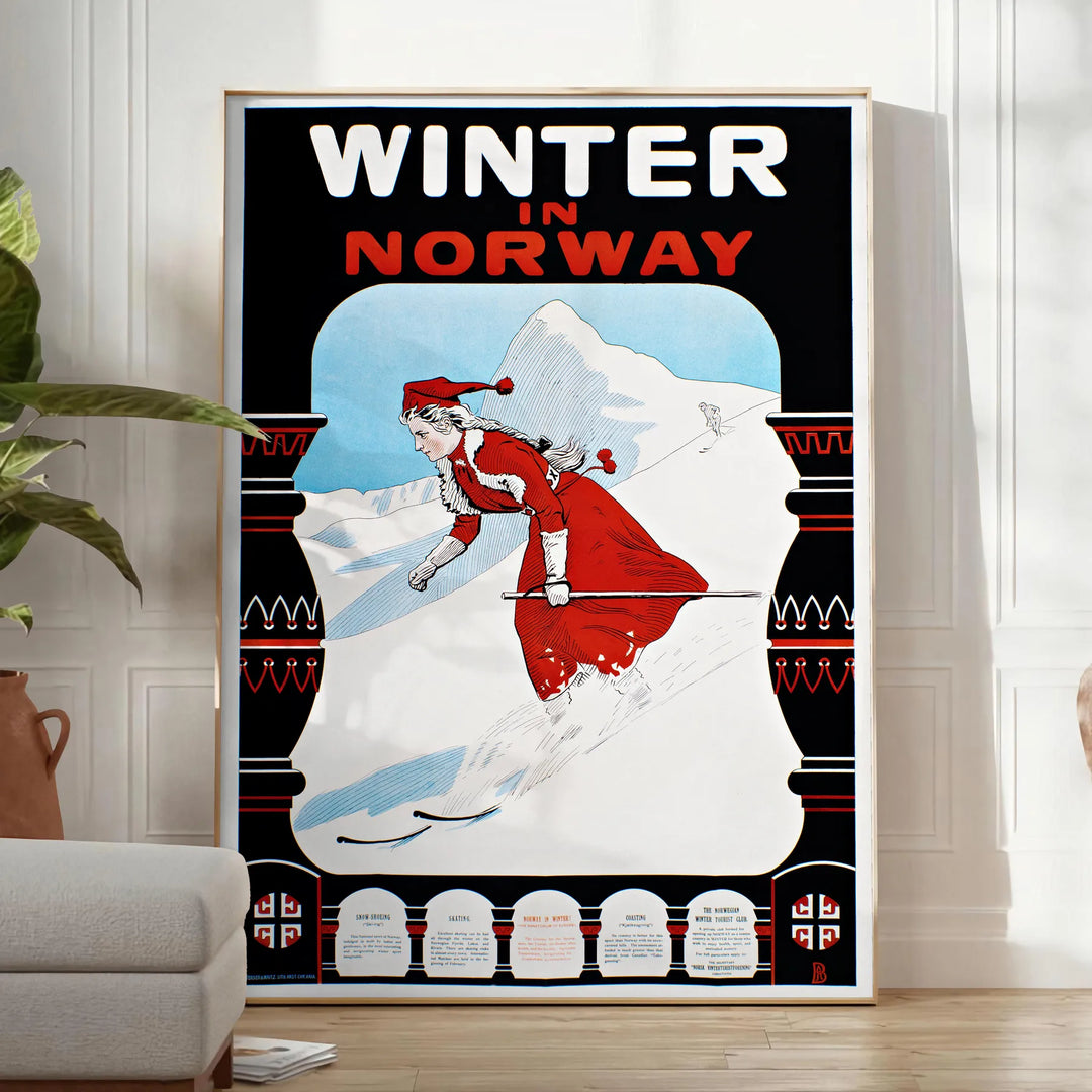 A minimalist ski travel poster featuring a snowy mountain landscape in gray and black tones - in a bright minimalist room with a plant and an armchair
