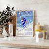 A ski scene with snowy slopes and blue skies - styled on a counter with eucalyptus and a bowl of lemons