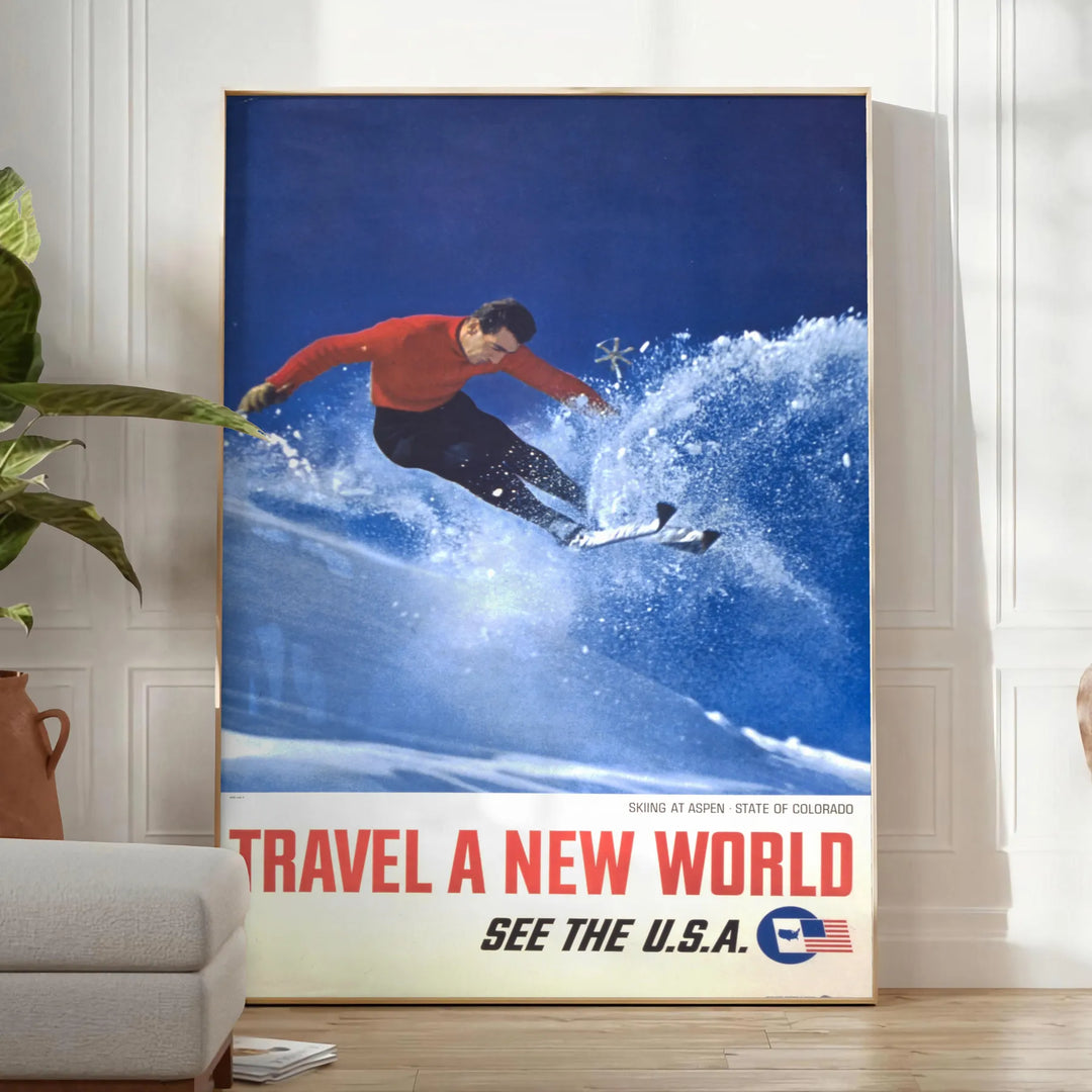A skiing scene with dynamic slopes in orange and blue hues - in a bright minimalist room with a plant and an armchair