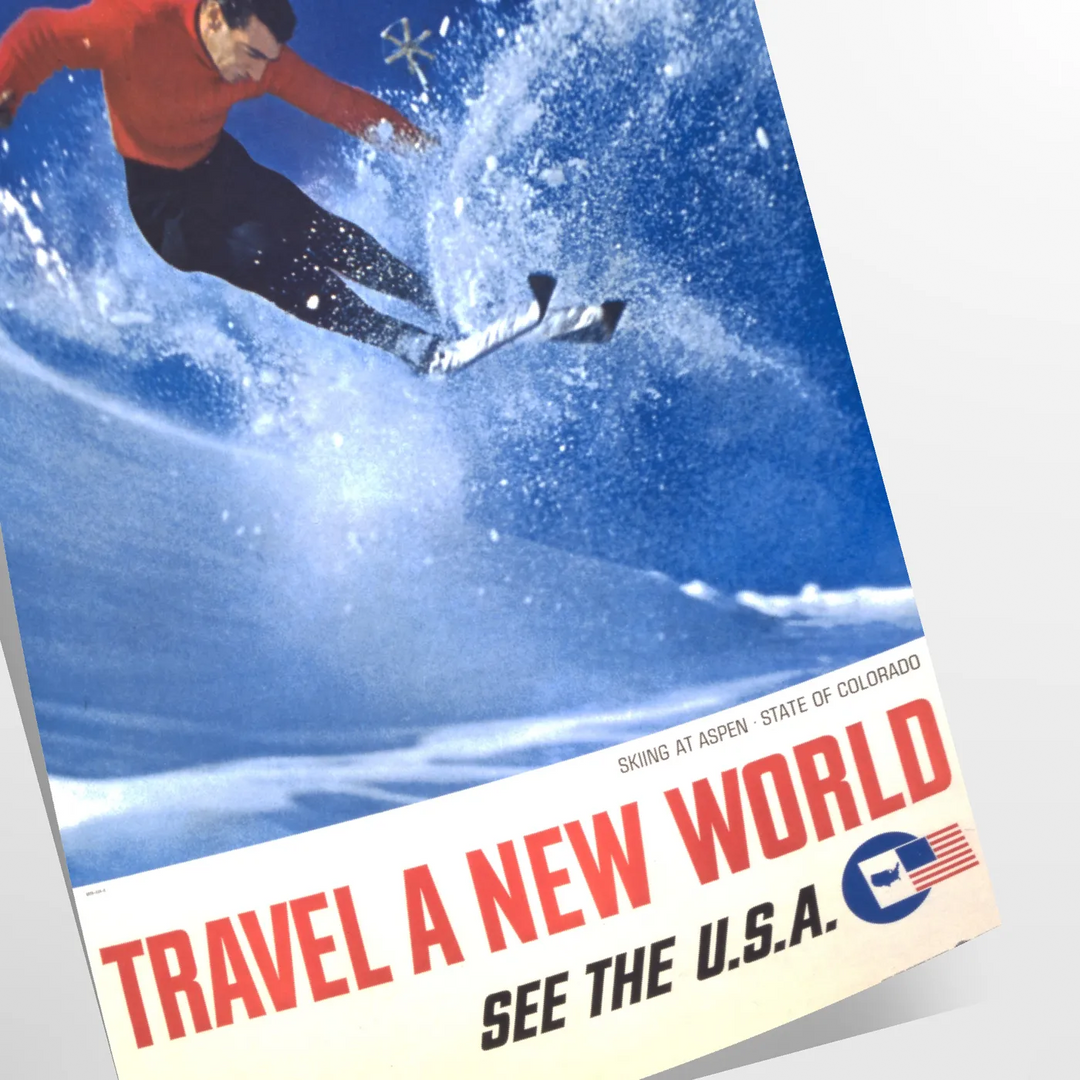 A skiing scene with dynamic slopes in orange and blue hues - as a rolled, unframed print