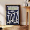 Abstract depiction of jazz musicians in gray and blue tones - beside a round wooden side table with books