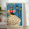 Vintage travel poster featuring Spain with rustic blue and brown tones - in a bright minimalist room with a plant and an armchair