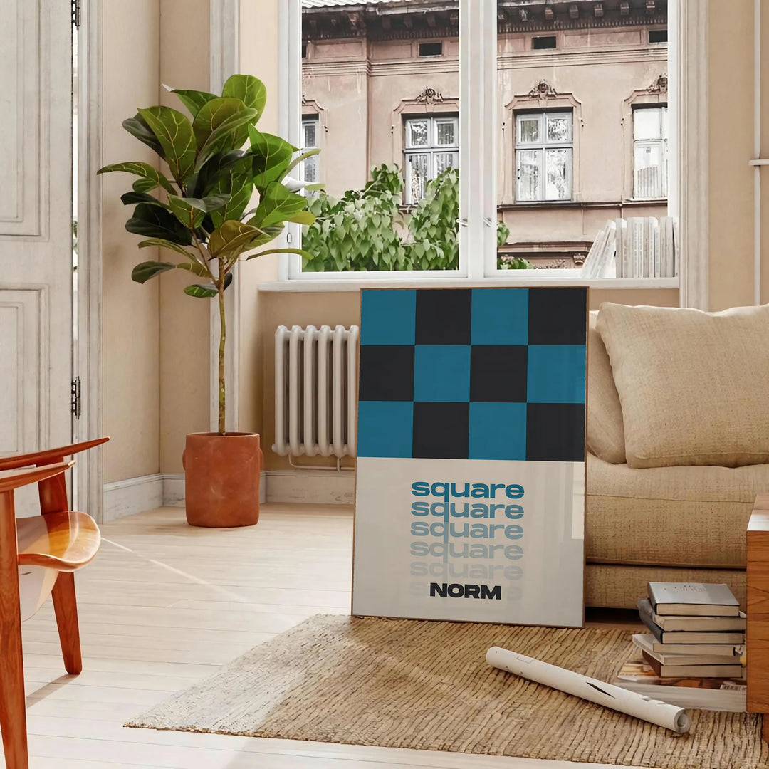 Abstract square shapes in black and brown tones - in a Parisian living room with a sofa and a fig plant