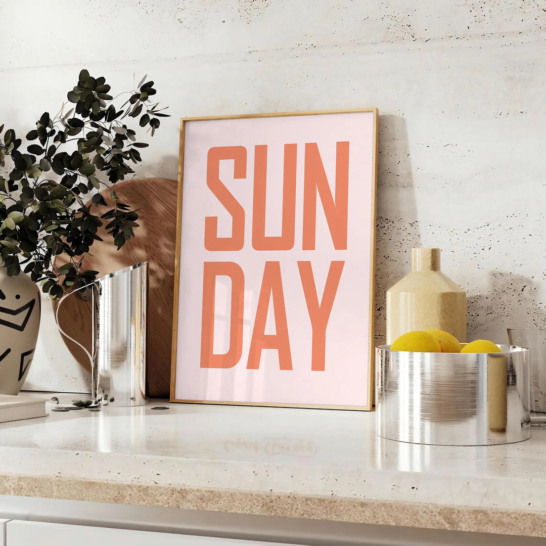Abstract design with warm brown and red hues featuring motivational text - styled on a counter with eucalyptus and a bowl of lemons