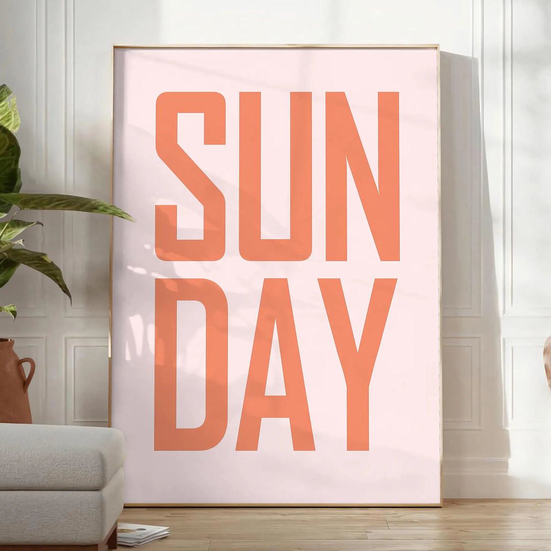 Abstract design with warm brown and red hues featuring motivational text - in a bright minimalist room with a plant and an armchair