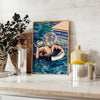 A stylized swimming pool scene with earthy browns and greens - styled on a counter with eucalyptus and a bowl of lemons