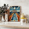 Vintage illustration of the Titanic in a swimming scene, with brown and oceanic blue tones - styled on a counter with eucalyptus and a bowl of lemons