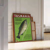 Illustration of Tasmania's landscapes with green hills and gray skies - leaning on a herringbone floor against a white panelled wall
