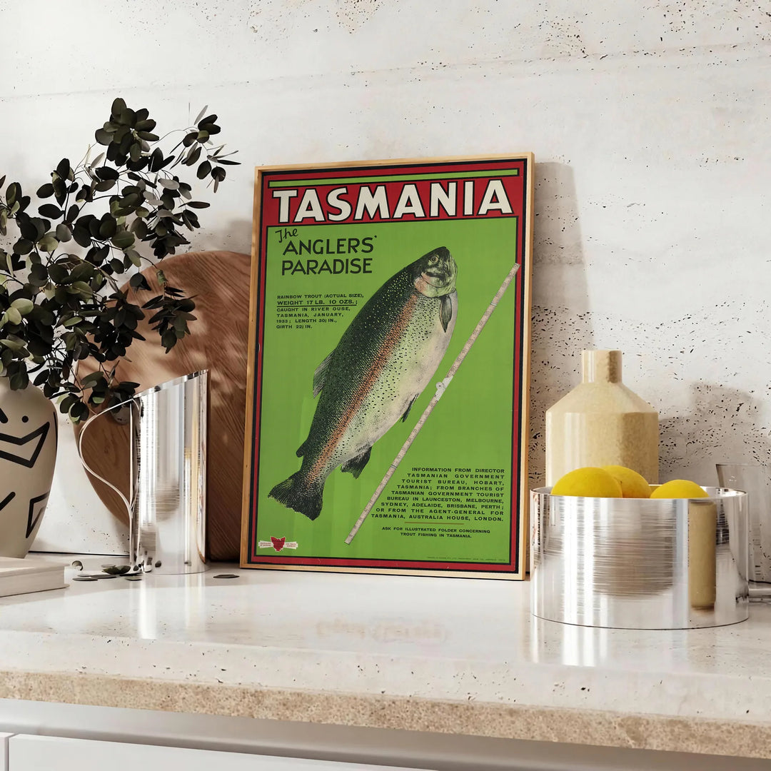 Illustration of Tasmania's landscapes with green hills and gray skies - styled on a counter with eucalyptus and a bowl of lemons