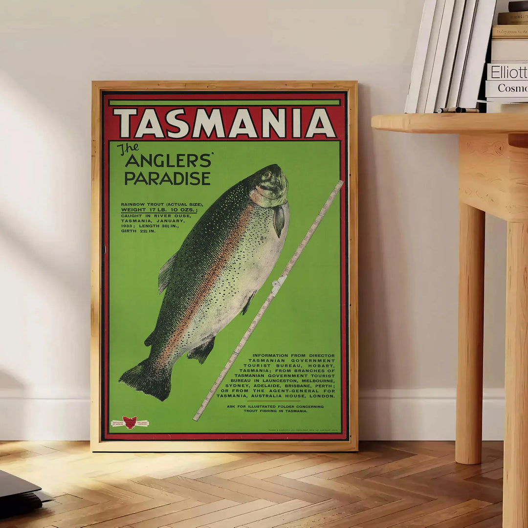 Illustration of Tasmania's landscapes with green hills and gray skies - beside a round wooden side table with books