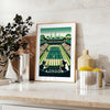 Retro illustration of Wimbledon tennis with green grass courts and players - styled on a counter with eucalyptus and a bowl of lemons