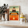 Art Deco poster featuring a tennis player aboard the Titanic - styled on a counter with eucalyptus and a bowl of lemons
