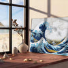 A large blue wave crashing against a rocky shore, with Mount Fuji in the background, by Hokusai - leaning on a herringbone floor against a white panelled wall