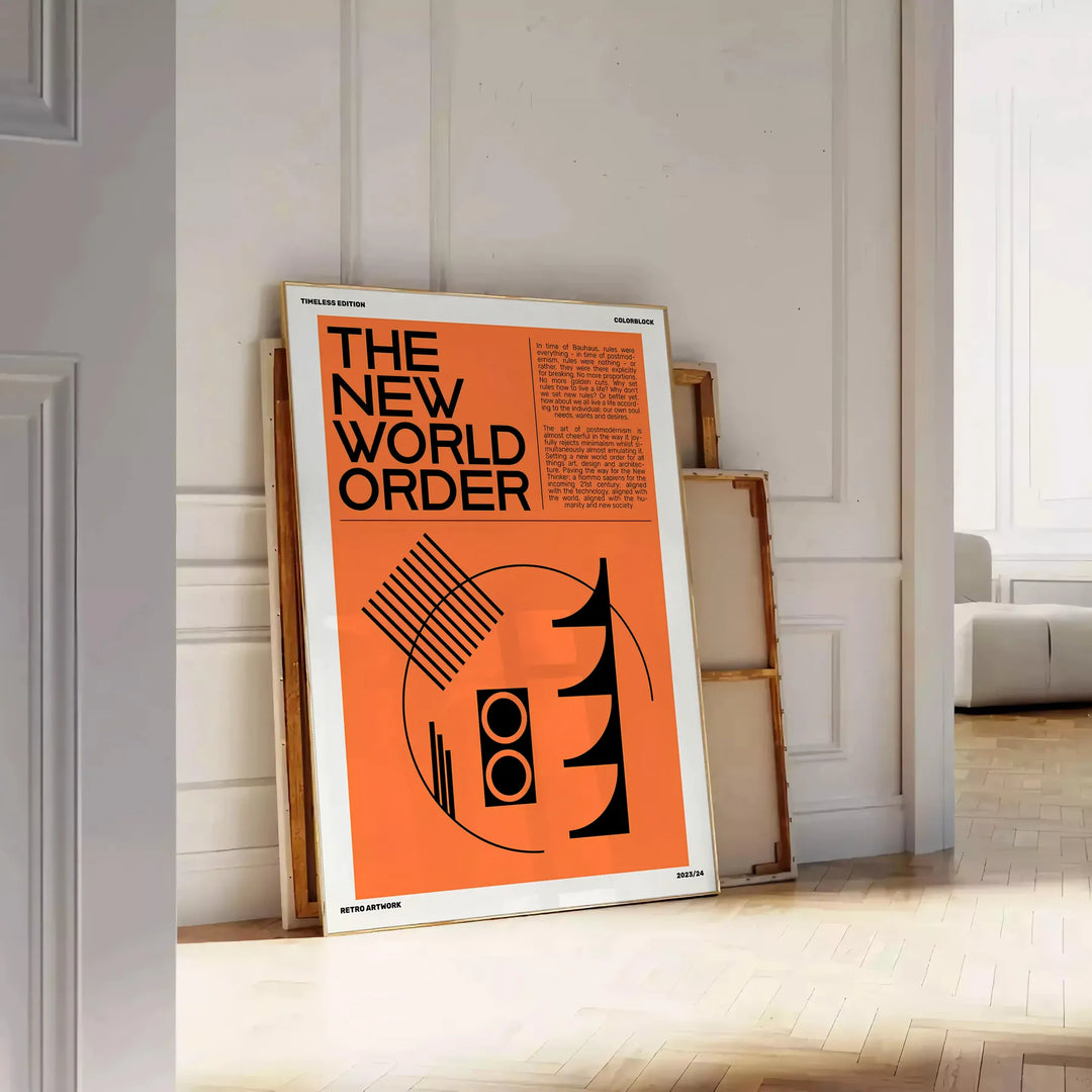 Abstract modern art with orange and black hues, titled 'The New World Order' - leaning on a herringbone floor against a white panelled wall