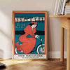 Travel poster featuring New York skyline with green and blue tones - beside a round wooden side table with books