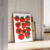 a colorful illustration of tomatoes on a blue background - leaning on a herringbone floor against a white panelled wall