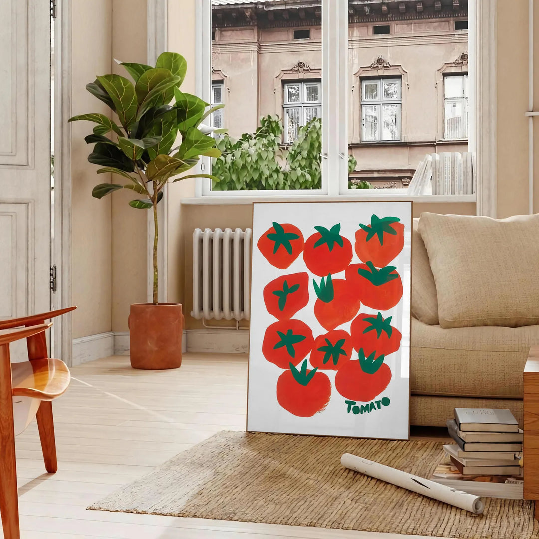 a colorful illustration of tomatoes on a blue background - in a Parisian living room with a sofa and a fig plant