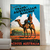 A vintage travel poster featuring a stylized landscape of Australia in black and blue tones - in a bright minimalist room with a plant and an armchair