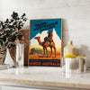Retro travel poster featuring the Trans Australian Railway with green and blue tones - styled on a counter with eucalyptus and a bowl of lemons
