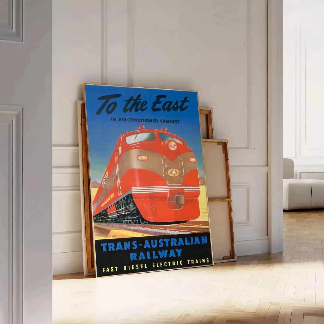 Vintage travel poster featuring the Trans Australian Railway in green and black hues - leaning on a herringbone floor against a white panelled wall