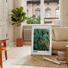 Abstract depiction of space with green and white tones - in a Parisian living room with a sofa and a fig plant