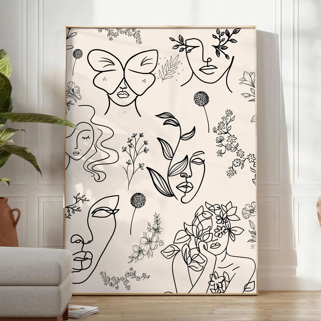 A modern poster featuring a sleek design in gray and black tones - in a bright minimalist room with a plant and an armchair