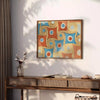 Abstract space design with gray and orange tones - styled on a counter with eucalyptus and a bowl of lemons