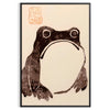 A frog with an unimpressed expression against a black and orange background - in a black frame