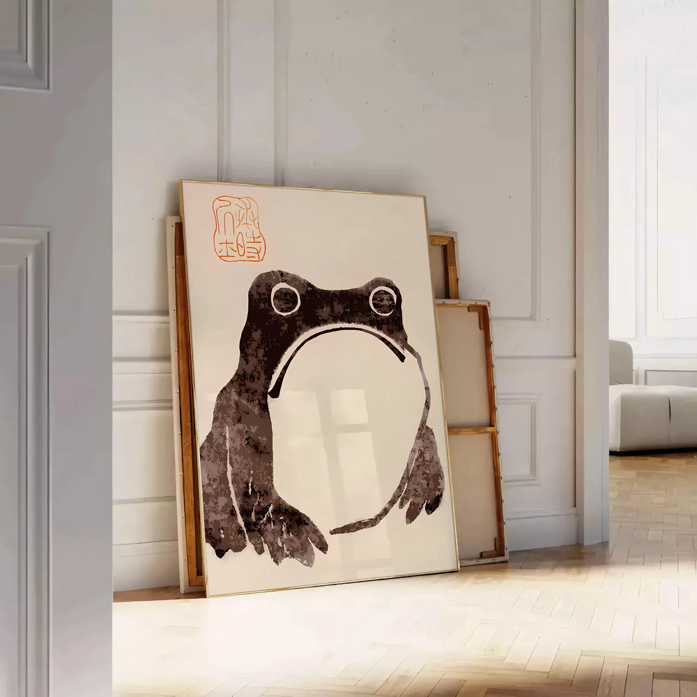 A frog with an unimpressed expression against a black and orange background