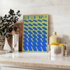Abstract depiction of a serene utopia with green and blue tones - styled on a counter with eucalyptus and a bowl of lemons