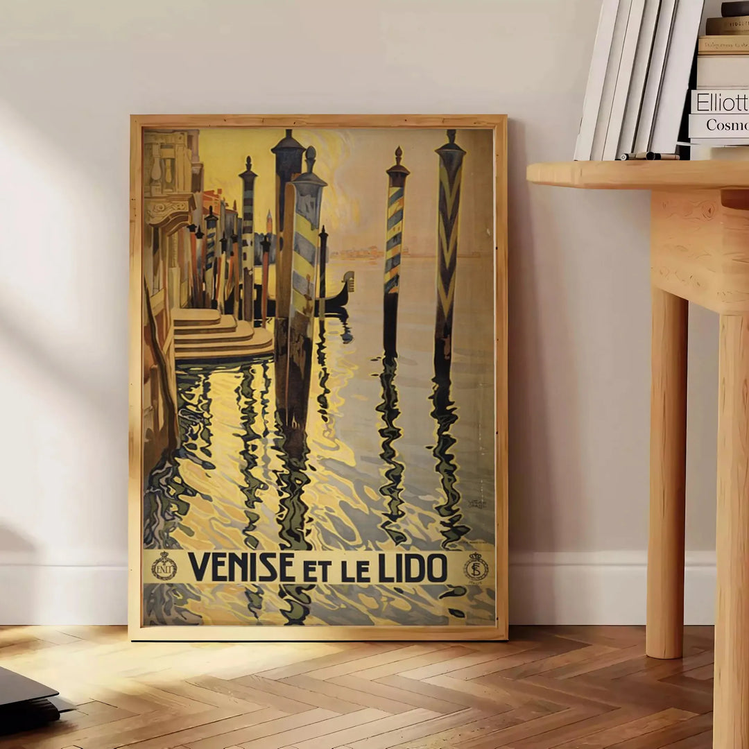 Stylized illustration of Venice canals with gondolas, in gray and black tones - beside a round wooden side table with books