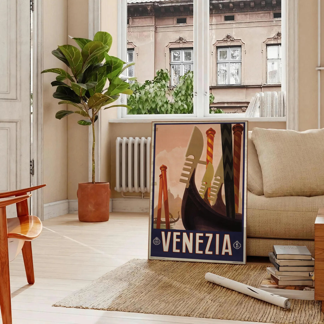 A vintage-style poster featuring iconic Venice canals and gondolas in green and black tones - in a Parisian living room with a sofa and a fig plant