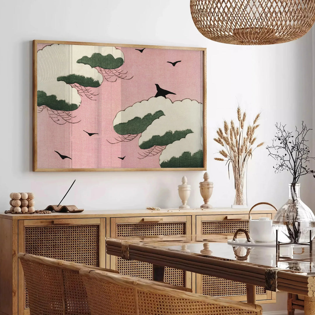 A vintage Japanese print featuring a bird in earthy tones of brown and green - in a Parisian living room with a sofa and a fig plant