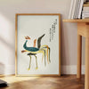 Illustration of a vintage Japanese bird in soft yellow and green tones - beside a round wooden side table with books