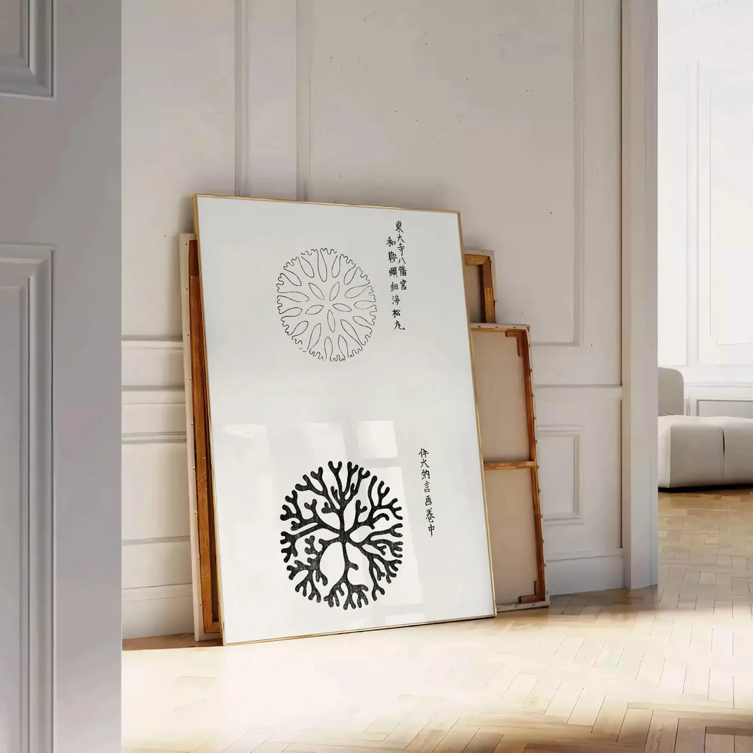 black and white vintage Japanese art featuring traditional motifs - leaning on a herringbone floor against a white panelled wall