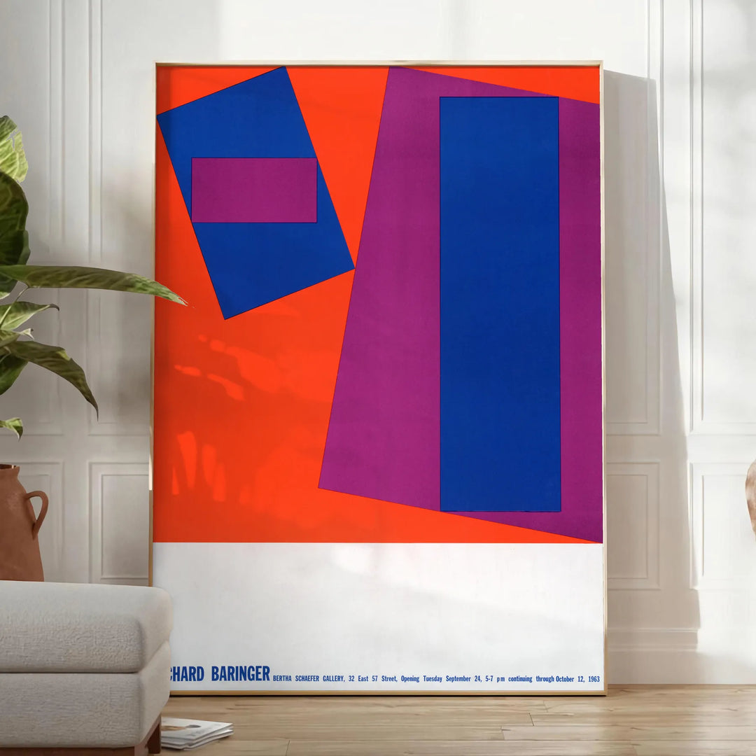 Vintage print featuring abstract space design in gray and orange tones - in a bright minimalist room with a plant and an armchair