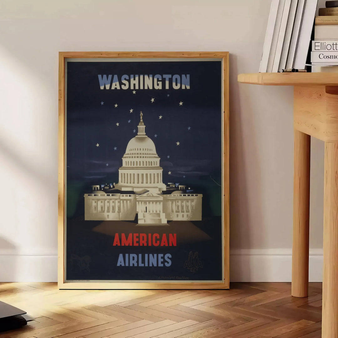Vintage poster featuring American Airlines in Washington, with black and green tones - beside a round wooden side table with books