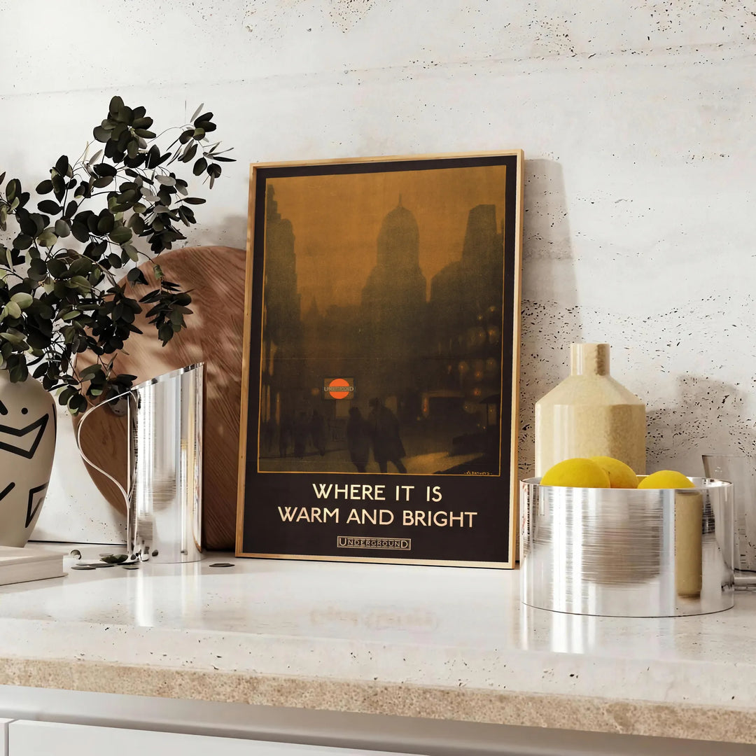 Vintage travel poster featuring a scenic landscape in rich browns and greens - styled on a counter with eucalyptus and a bowl of lemons