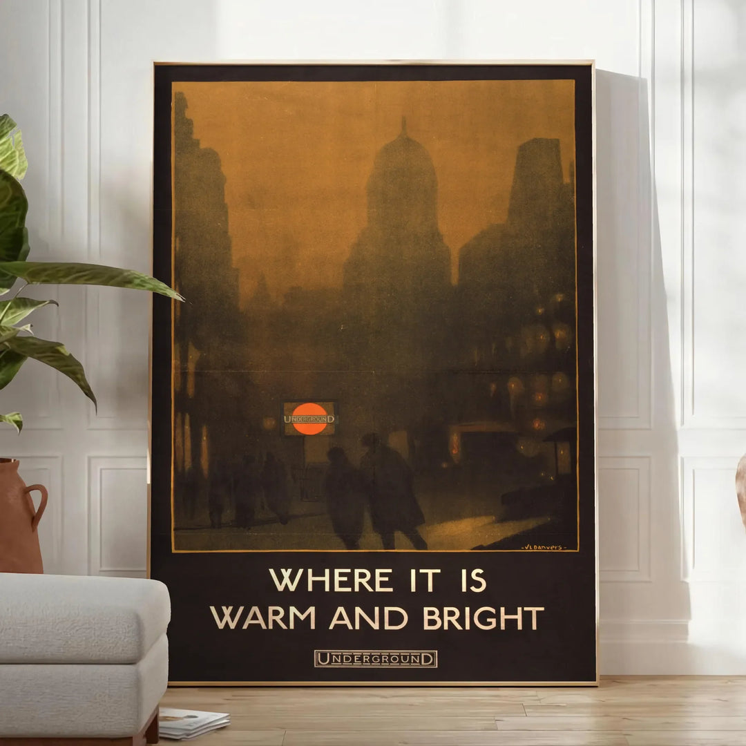 Vintage travel poster featuring a scenic landscape in rich browns and greens - in a bright minimalist room with a plant and an armchair