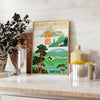 Vintage travel poster of Japan featuring serene green and blue tones - styled on a counter with eucalyptus and a bowl of lemons