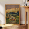 Stylized landscape of Abruzzo, Italy in muted black and green tones - beside a round wooden side table with books