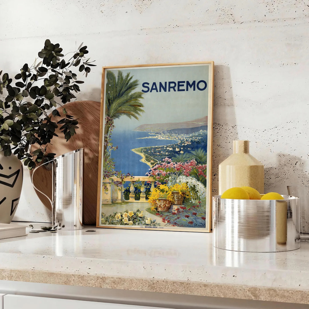 Póster de viaje vintage de Sanremo, Italia, con tonos marrones terrosos y verdes exuberantes - sobre una encimera con eucalipto y un cuenco de limones