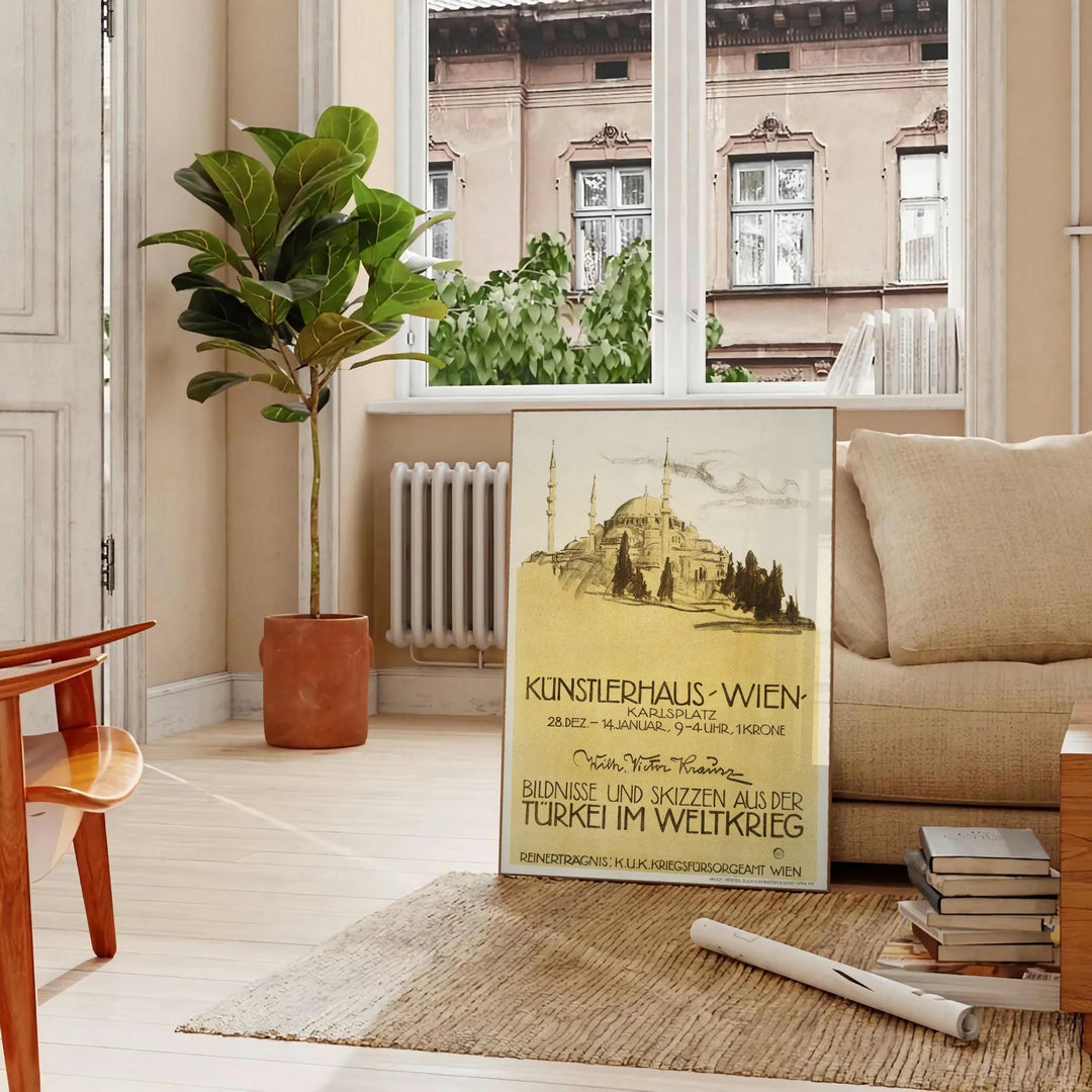 Vintage travel poster featuring Turkey with green and orange tones - in a Parisian living room with a sofa and a fig plant