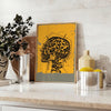Vintage illustration of a human head in black and green tones - styled on a counter with eucalyptus and a bowl of lemons
