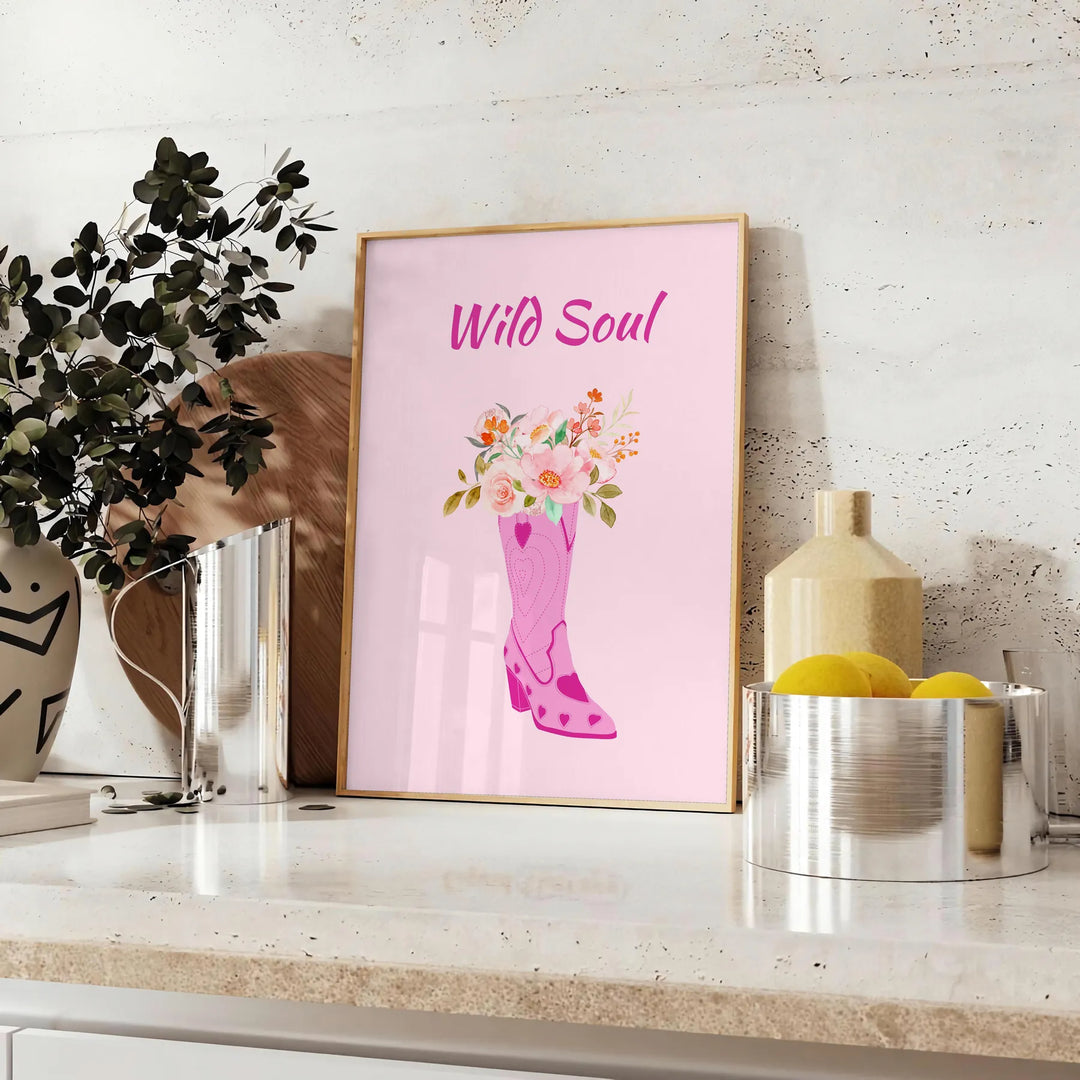 abstract depiction of a wild soul with gray and orange tones - styled on a counter with eucalyptus and a bowl of lemons