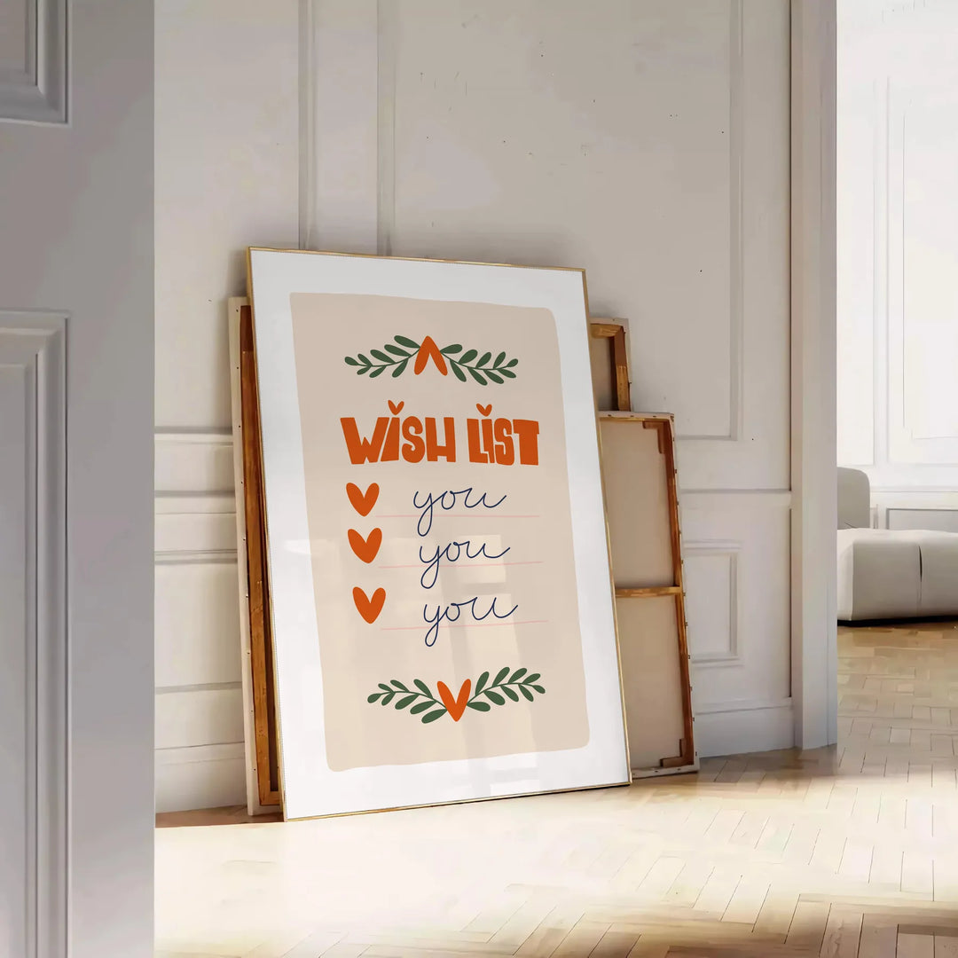 A minimalist poster featuring a wish list in gray and green tones - leaning on a herringbone floor against a white panelled wall