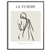 Bohemian-style portrait of a woman with floral elements and warm earth tones - in a black frame