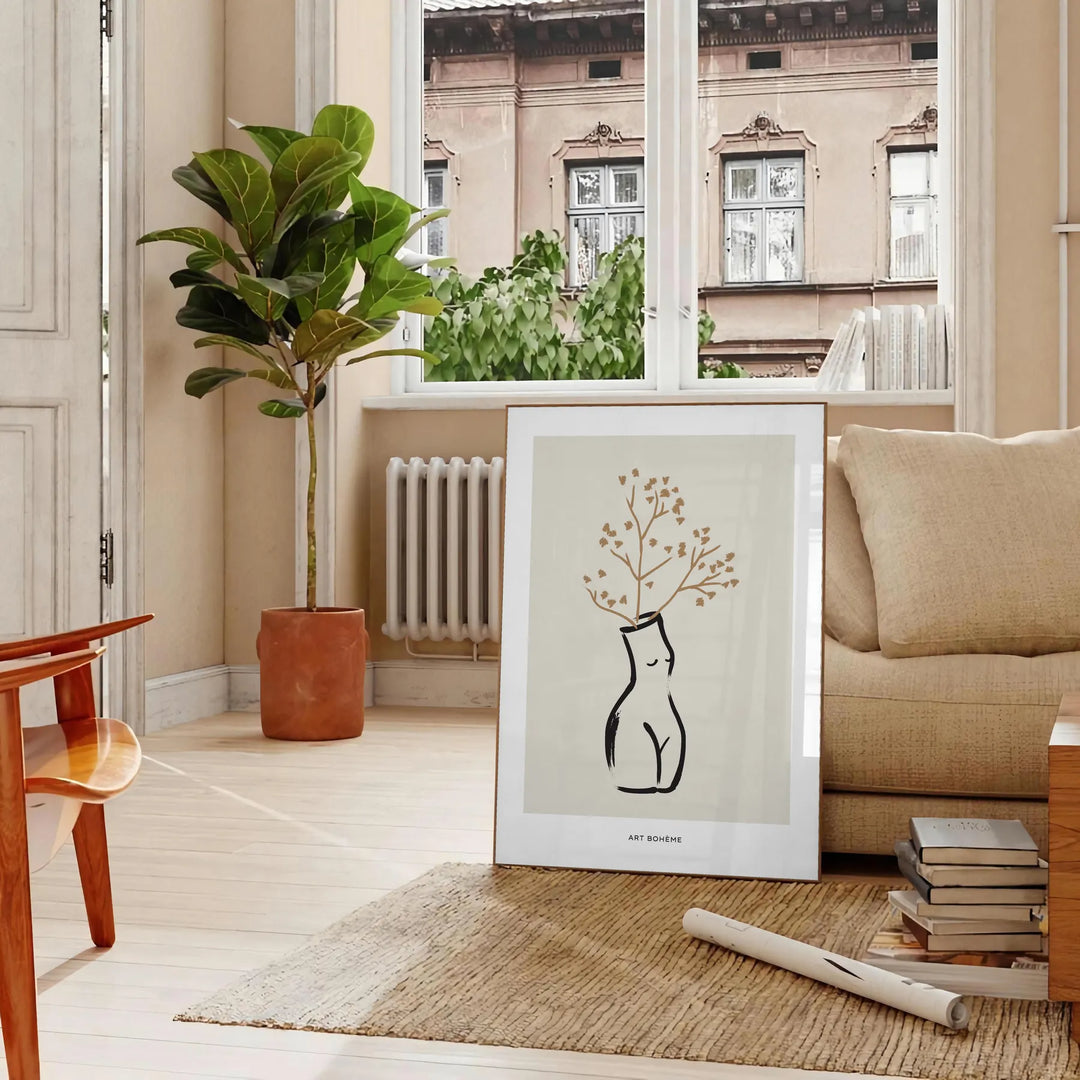 Silhouette of a woman in bohemian style against gray and black background - in a Parisian living room with a sofa and a fig plant