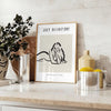 A bohemian-style illustration of a woman surrounded by celestial elements - styled on a counter with eucalyptus and a bowl of lemons