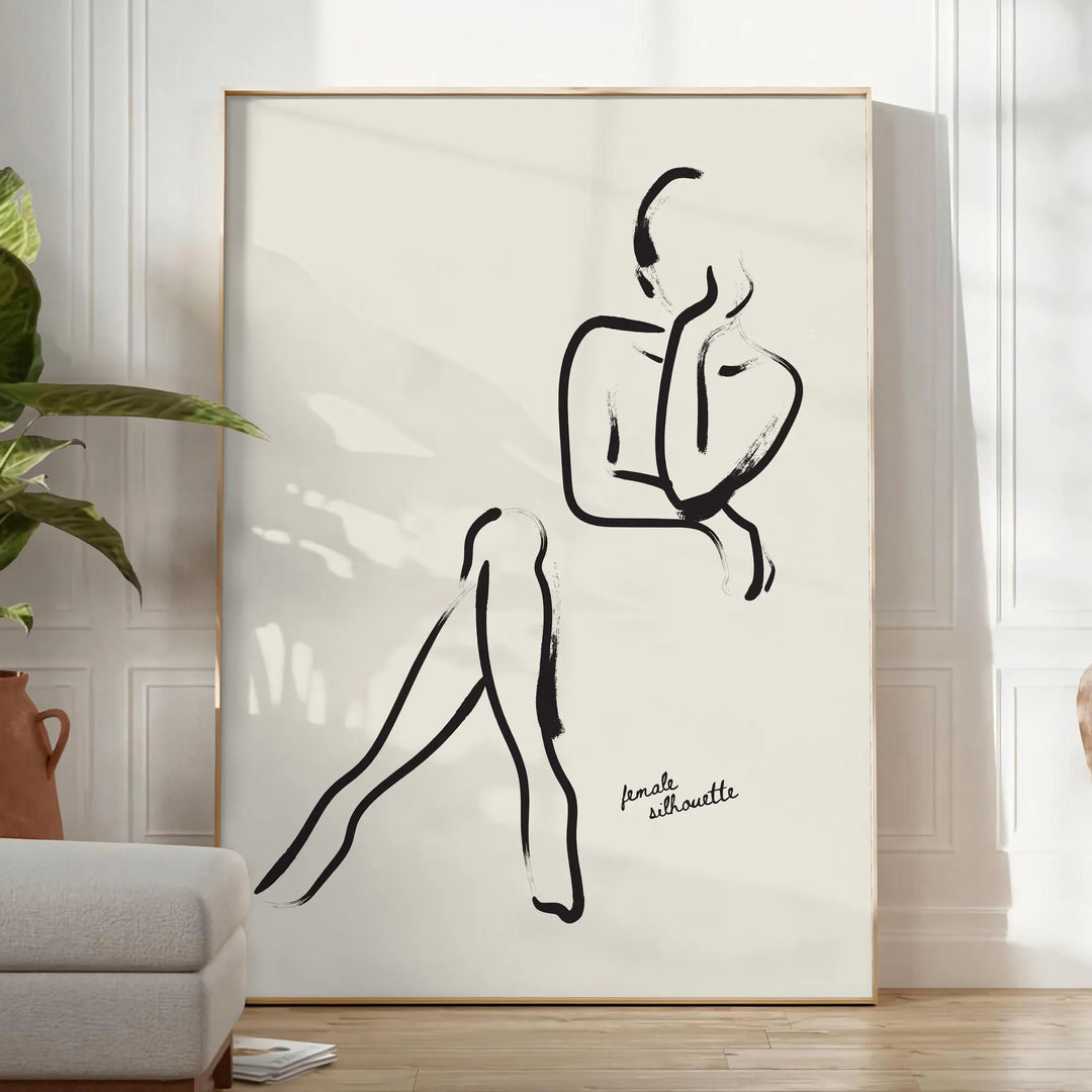 A bohemian style portrait of a woman with colorful patterns and designs - in a bright minimalist room with a plant and an armchair